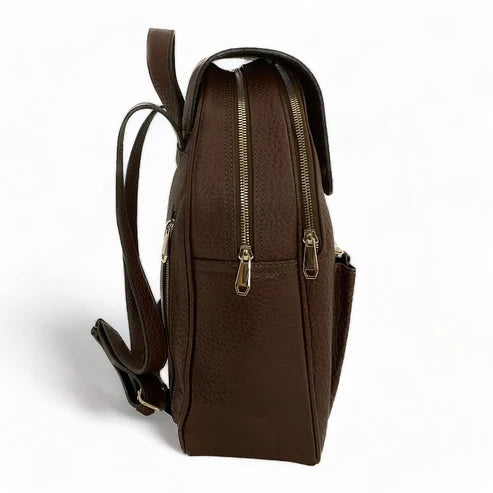 Stylish brown leather women’s backpack with laptop compartment, adjustable straps, and premium handmade design — perfect for work, travel, and everyday use.