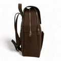 Brown leather women’s backpack with stylish design, premium genuine leather finish, and laptop compartment — perfect for everyday use, work, or travel.