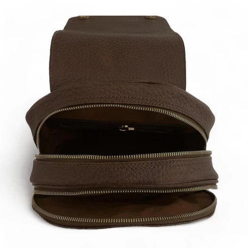 Stylish brown leather women’s backpack with laptop compartment, adjustable straps, and premium handmade design — perfect for work, travel, and everyday use.
