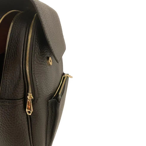 LeatherLuxe black leather women’s backpack with sleek minimalist design, adjustable shoulder straps, and gold hardware — perfect for work, travel, or everyday style.