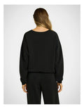 Rockwear Travel Hip Length Crew Jumper in Black, women's cozy crew neck sweater with relaxed fit and ultra-smooth fabric, perfect for travel and everyday wear.