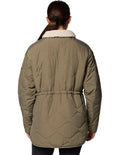 Columbia Birchwood II Quilted Jacket in Stone Green with Sherpa-lined interior, water-resistant shell, and zippered hand pockets