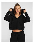 Rockwear Travel Hip Hood Half Zip in Black, featuring a cozy hood and front pockets for a relaxed, stylish look.