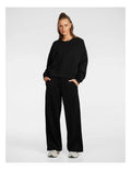 Rockwear Travel Hip Length Crew Sweater in Black, women’s relaxed fit, long sleeve sweater for everyday comfort and style.