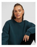 Rockwear Travel Hip Length Crew Sweater in Midnight Green, offering a cozy and relaxed fit for everyday comfort.