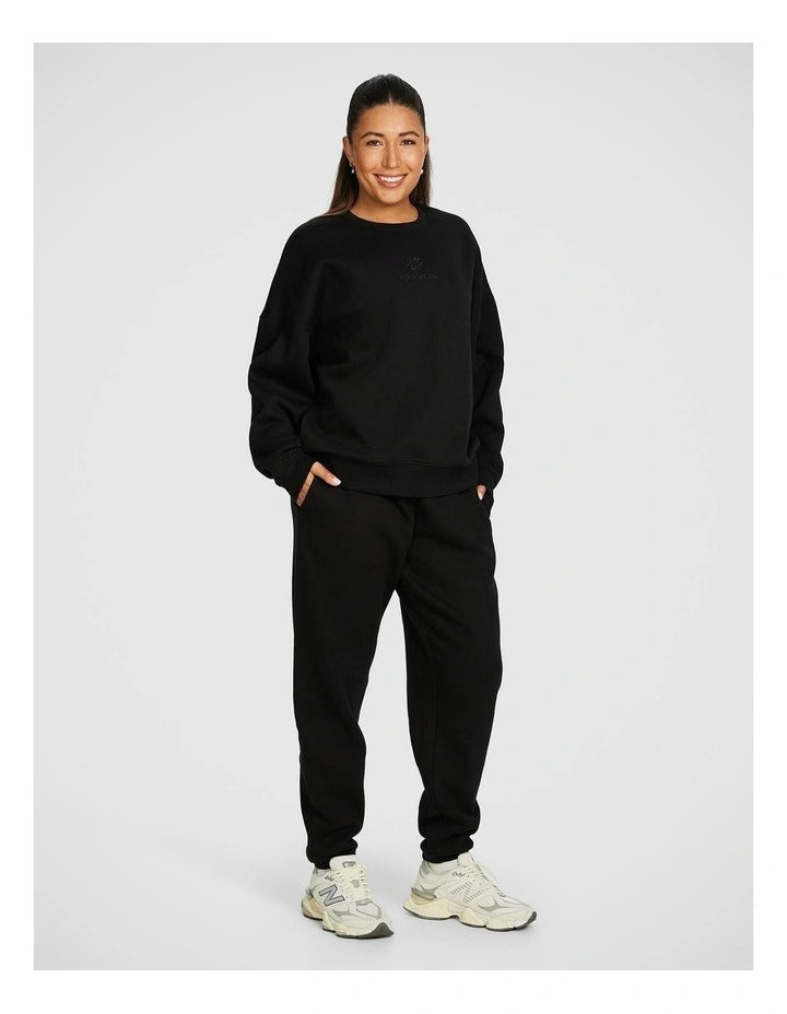 Rockwear Cosy Fleece Longline Crew Sweatshirt in Black offering full coverage and comfort.