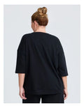Taking Shape Patch Pocket Sweat in Black – plus size cotton-blend top with oversized front patch pockets, round neckline, and relaxed fit