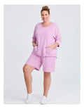 Taking Shape Patch Pocket Sweat in Lilac – plus size cotton-blend top with oversized patch pockets, round neckline, and relaxed fit