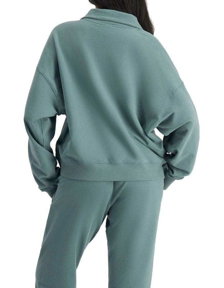 Bonds Move Half Zip Pullover with zip opening, stand collar and kangaroo pockets
