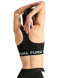 Puma 4Keeps Strong Bra for women with drycell technology, racerback straps, and branded elastic waistband
