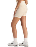 Move Rib Seamless Midi Short with jacquard knit design, wide waistband, stretchy ribbed fabric, and moisture-wicking finish for active comfort