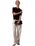 Calvin Klein women’s mock neck top in lyocell cotton blend with ribbed trims, classic fit, and signature logo.