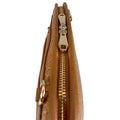 Light brown leather clutch bag with crocodile-style texture, crossbody shoulder strap, and elegant design — LeatherLuxe women’s handbag.