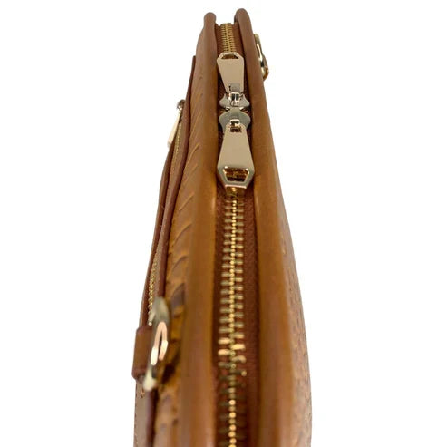 Light brown leather clutch bag with crocodile-style texture, crossbody shoulder strap, and elegant design — LeatherLuxe women’s handbag.