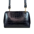 LeatherLuxe black leather clutch bag with detachable shoulder strap and crossbody option – elegant women’s evening handbag made of premium genuine leather.