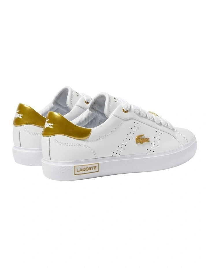 Lacoste Powercourt 2.0 Sneaker in White/Gold, featuring a sleek leather upper with gold accents for a premium, stylish look.