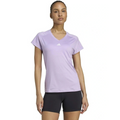 Woman wearing a light purple Adidas t-shirt on a white background