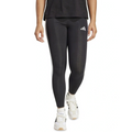Person wearing black Adidas leggings with white stripes on a white background