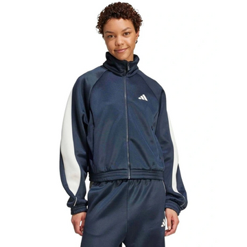 Person wearing a navy tracksuit with white sleeves on a white background