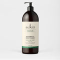Sukin Botanical Body Wash bottle on a light gray background