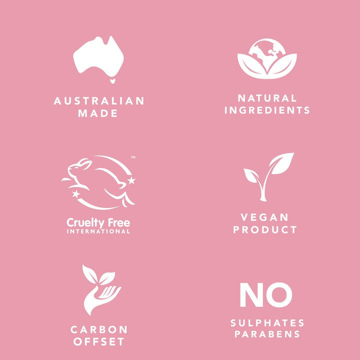 Set of icons and text on a pink background indicating Australian made, natural ingredients, cruelty free, vegan product, carbon offset, and no sulphates or parabens.