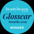 Blue badge with 'beautyheaven.com.au Glossscar Awards 2019 Winner' text