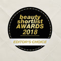 Badge for 'Beauty Shortlist Awards 2018 Editor's Choice' on a textured beige background