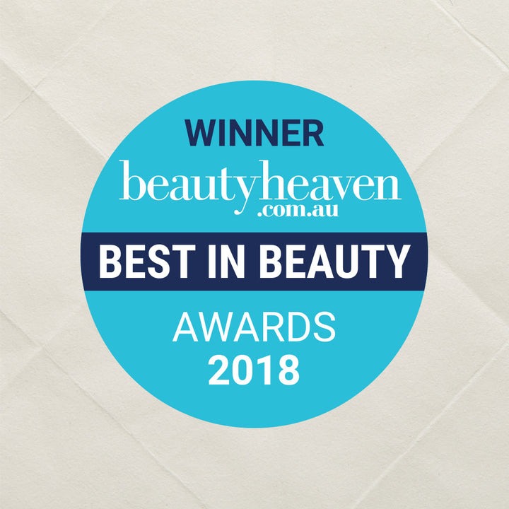 Winner badge for Best in Beauty Awards 2018 from beautyheaven.com.au on a textured beige background