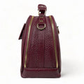 Elegant dark red genuine leather women’s satchel handbag with structured medium design and gold-tone accents — perfect for everyday and office wear.