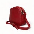 LeatherLuxe red leather women's shoulder bag with adjustable crossbody strap, elegant and stylish design for everyday fashion.
