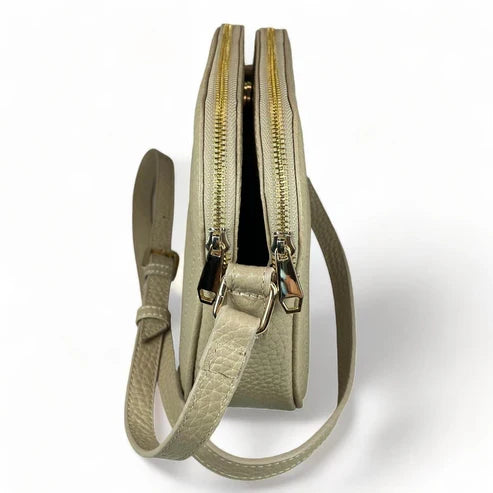 Cream leather women’s shoulder bag and crossbody by LeatherLuxe – elegant, premium quality handbag with adjustable strap and gold-tone hardware.