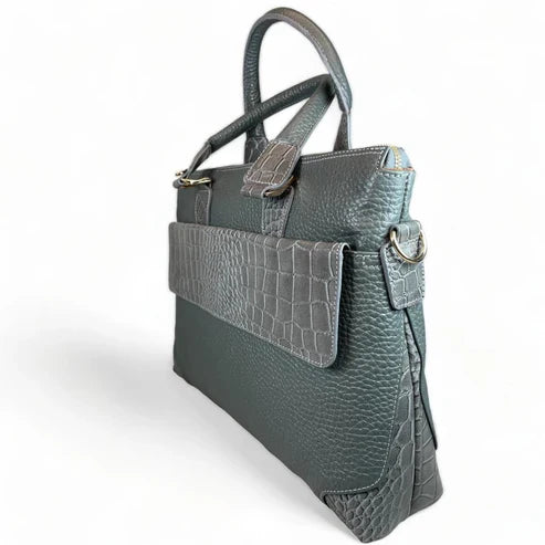 Premium gray leather laptop bag for men and women – sleek unisex professional briefcase with handle and shoulder strap for business and travel.