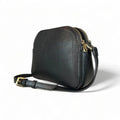 Premium black leather crossbody shoulder bag with adjustable strap, sleek minimalist design, and high-quality stitching for everyday use.