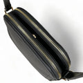 Premium black leather crossbody shoulder bag with adjustable strap, sleek minimalist design, and high-quality stitching for everyday use.