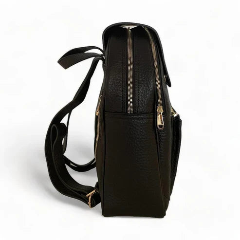 LeatherLuxe black leather women’s backpack with sleek minimalist design, adjustable shoulder straps, and gold hardware — perfect for work, travel, or everyday style.