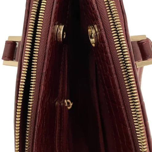 LeatherLuxe premium red leather office bag for professionals, stylish shoulder bag with sleek design, durable craftsmanship, and elegant finish.