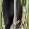 Elegant green crocodile-pattern leather clutch crossbody bag with gold hardware and detachable strap, perfect for evening or casual outings.