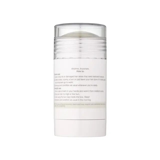 White cylindrical container with text on a white background