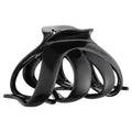 Black hair clip on a white background