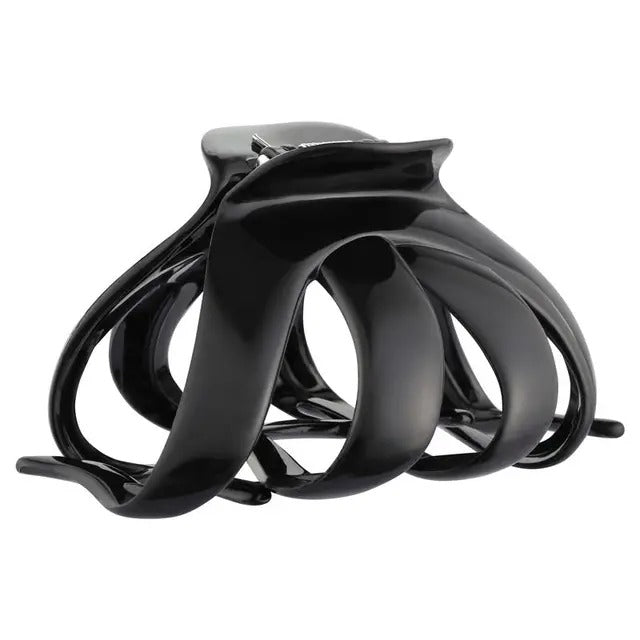 Black hair clip on a white background