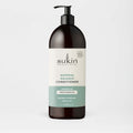 Sukin Natural Balance Conditioner bottle on a light gray background