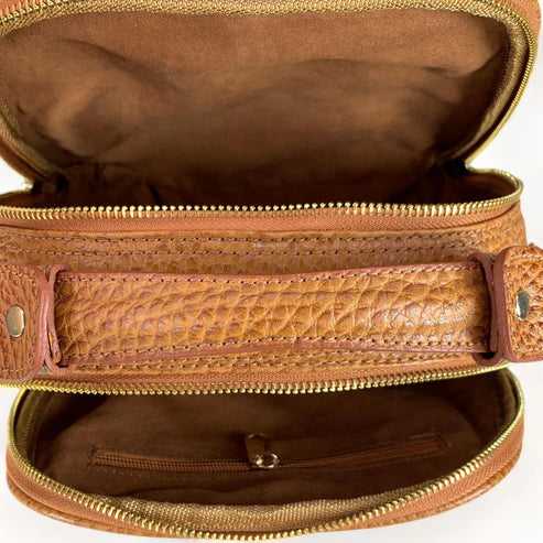 LeatherLuxe light brown leather tote bag with classic design, elegant stitching, and versatile style for everyday use.