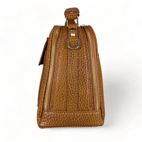 LeatherLuxe light brown leather tote bag with classic design, elegant stitching, and versatile style for everyday use.