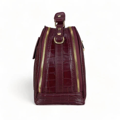 Red leather women's handbag – premium satchel and shoulder bag with elegant stitching, gold-tone hardware, and adjustable strap – luxury fashion accessory for women.