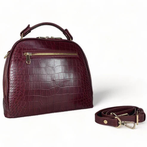 Red leather women's handbag – premium satchel and shoulder bag with elegant stitching, gold-tone hardware, and adjustable strap – luxury fashion accessory for women.