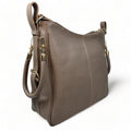 LeatherLuxe Khaki Leather Tote Bag – Elegant premium women’s handbag made of genuine leather with spacious design and stylish finish.