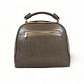Elegant khaki leather handbag for women with shoulder strap and top handle, perfect for casual and formal outfits.