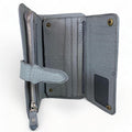 Genuine gray leather clutch with matching card holder, stylish and elegant women’s accessory for everyday and formal occasions.