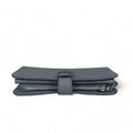 Genuine gray leather clutch with matching card holder, stylish and elegant women’s accessory for everyday and formal occasions.