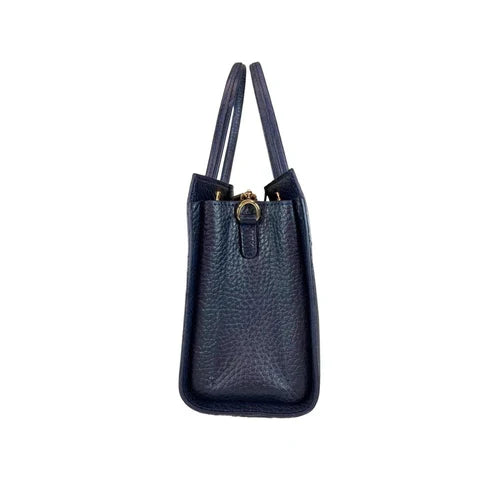 Navy blue women’s genuine leather handbag with shoulder and crossbody strap — elegant and stylish design for everyday use.